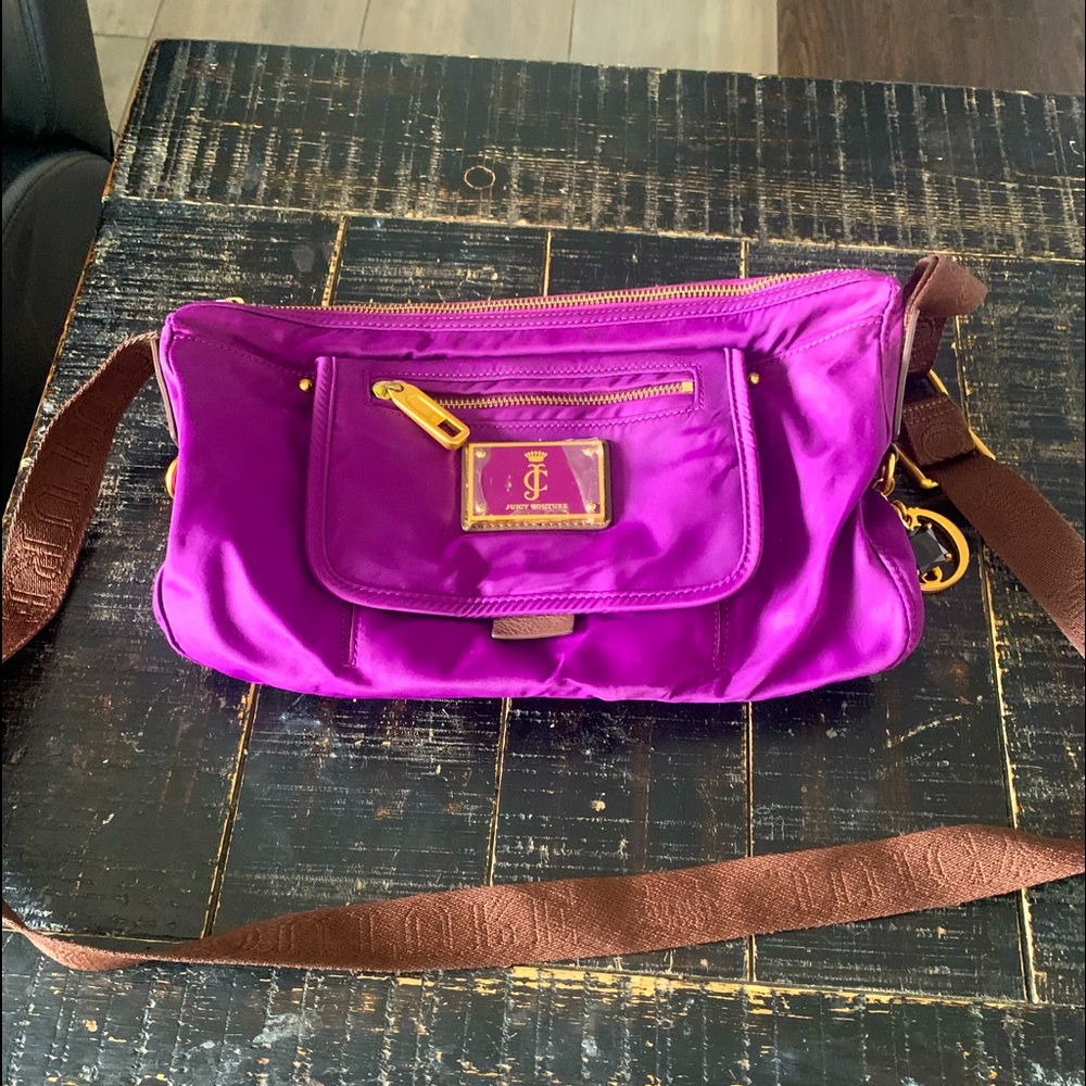 Cross body Couture purse.
